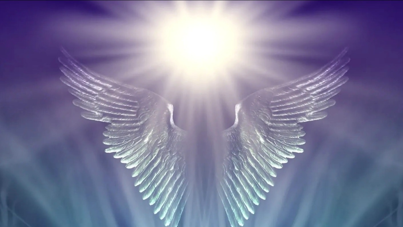 Glowing angel wings divine light